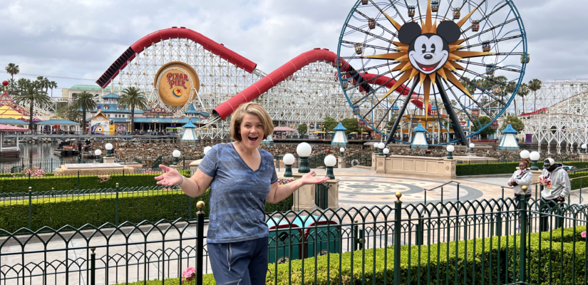 Rebecca in front of the Mickey Farris Wheel